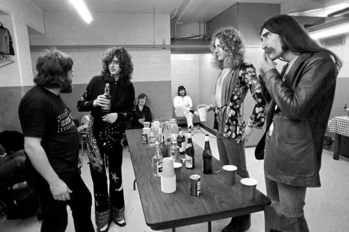 Led Zeppelin and their backstage beverages, a sacred ritual.